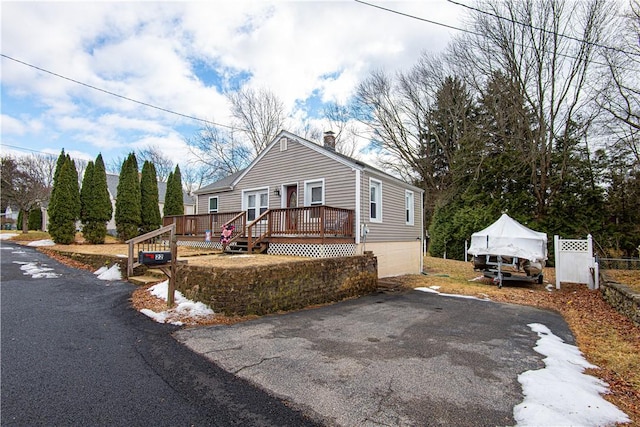 view of front of house featuring a wooden deck