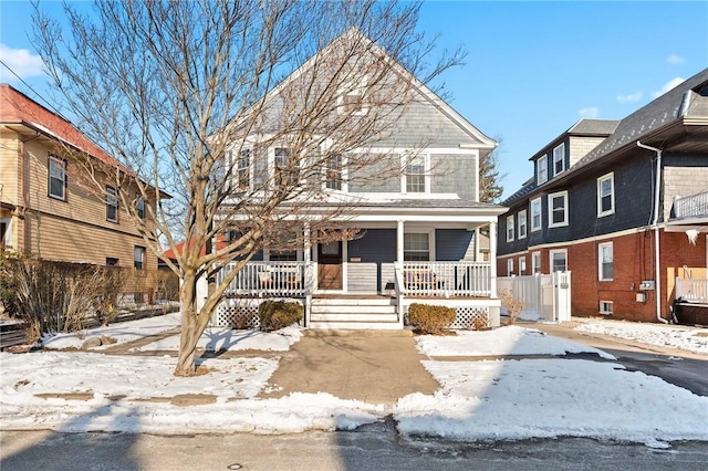 front facade featuring covered porch