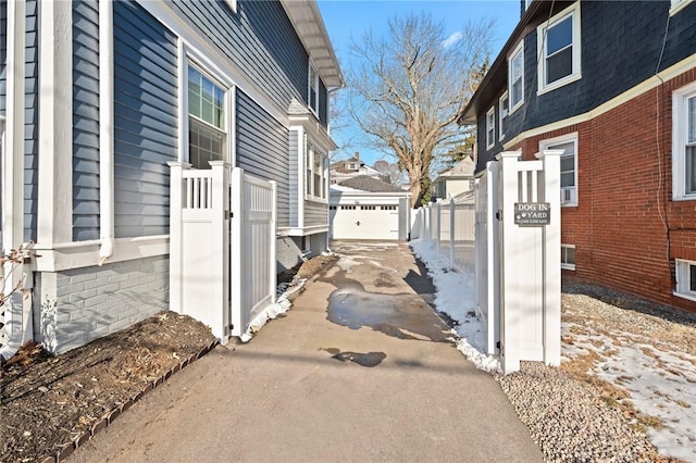 view of side of property with a garage