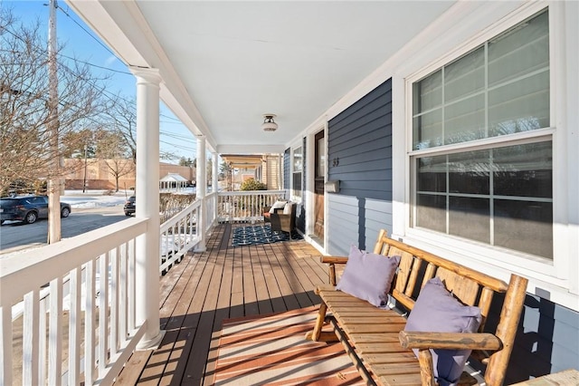 deck featuring covered porch