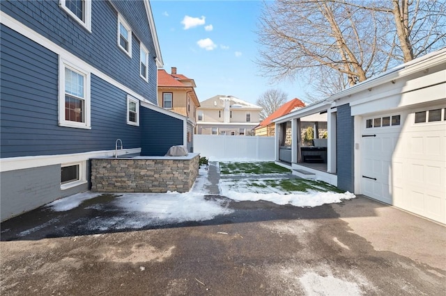 exterior space with a garage