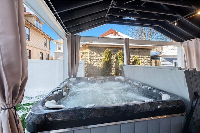 exterior space featuring a hot tub