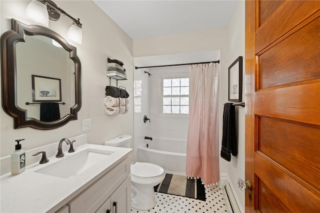 full bathroom with shower / tub combo with curtain, vanity, and toilet