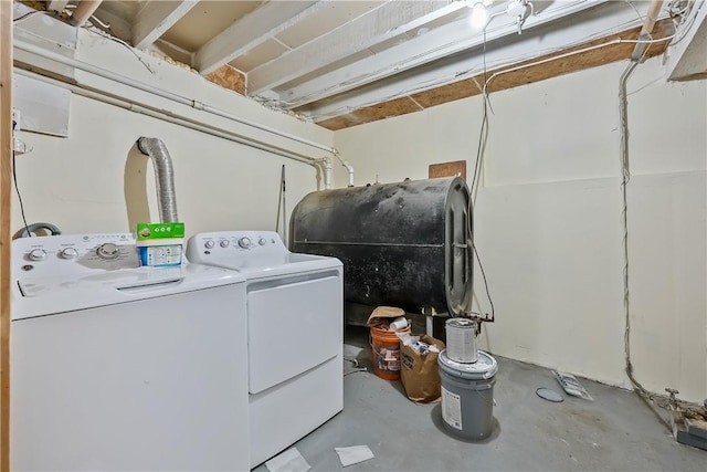 clothes washing area featuring separate washer and dryer