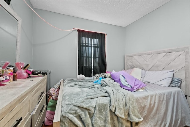 bedroom with a textured ceiling