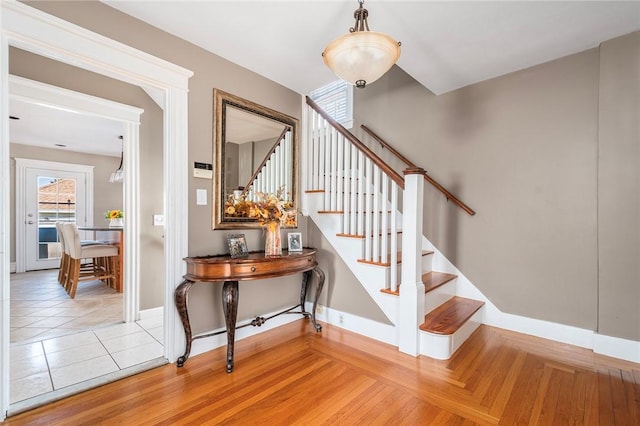 stairway featuring tile patterned floors