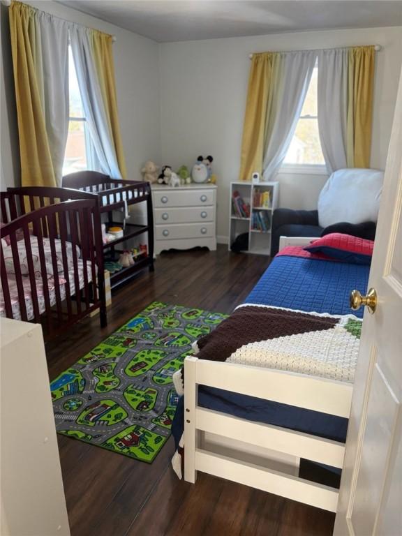 bedroom featuring dark hardwood / wood-style floors