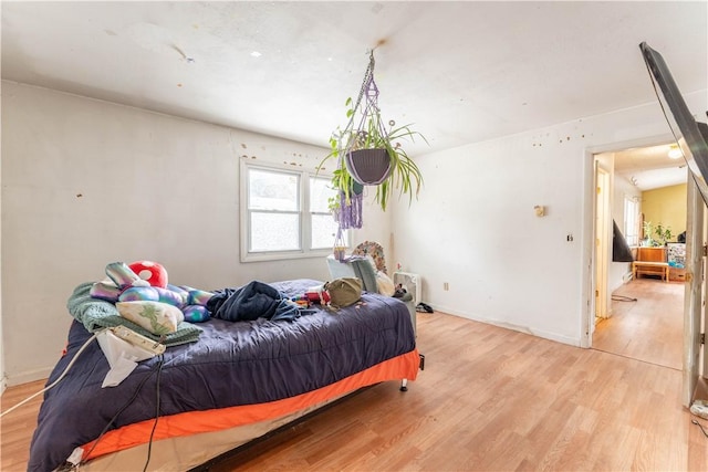 bedroom featuring light hardwood / wood-style floors