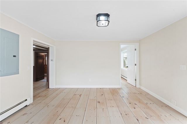 unfurnished room with a baseboard radiator, ornamental molding, electric panel, and light wood-type flooring