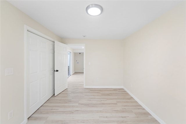 hallway featuring light hardwood / wood-style floors