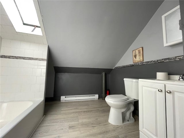 full bathroom with toilet, wood-type flooring, vaulted ceiling, a baseboard radiator, and vanity