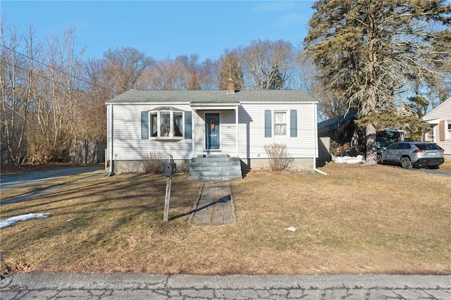 view of front of home with a front yard