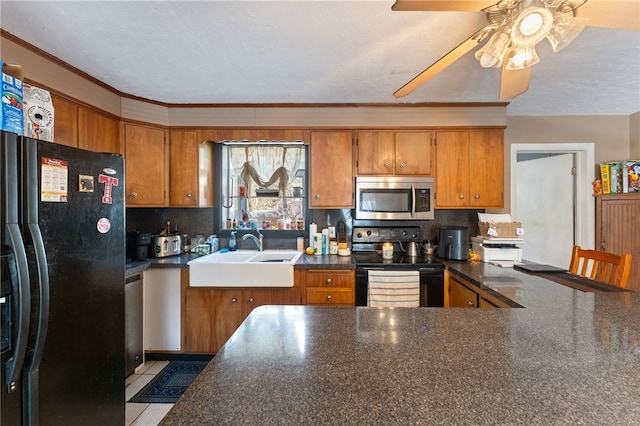 kitchen with sink, crown molding, ceiling fan, tasteful backsplash, and black appliances