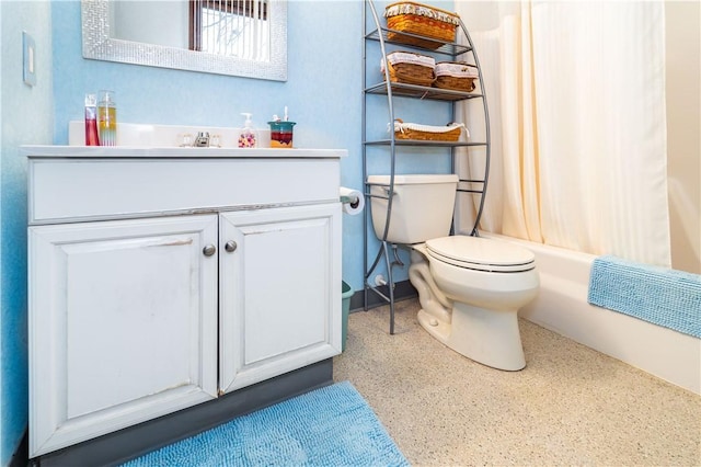 full bathroom with vanity, toilet, and shower / tub combo