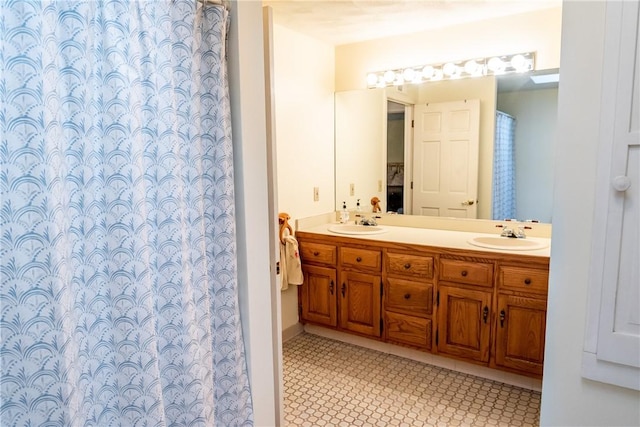 bathroom with vanity and tile patterned floors