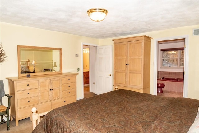 bedroom with ensuite bathroom