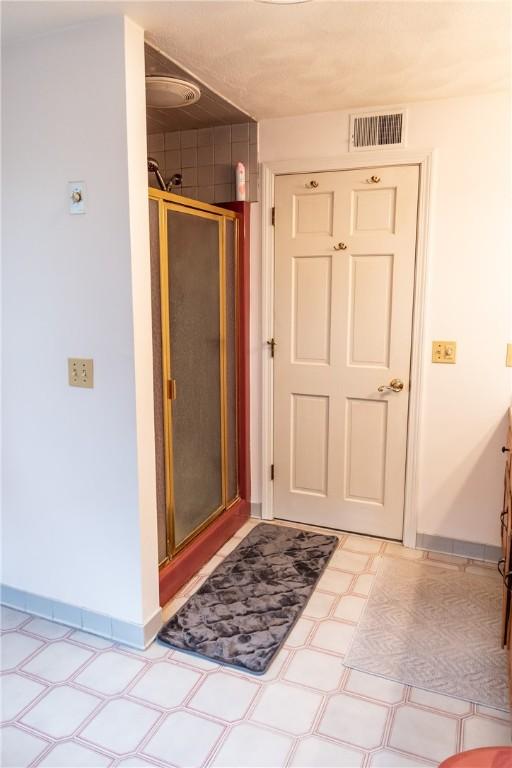 bathroom with walk in shower