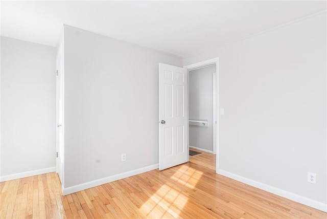 empty room featuring light hardwood / wood-style floors