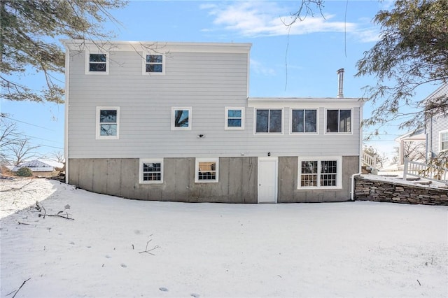 view of snow covered house