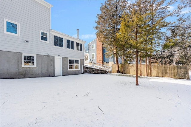 view of snow covered house