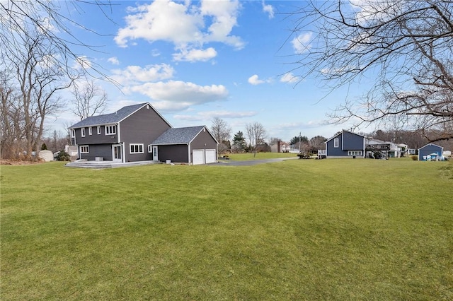 view of yard with a garage