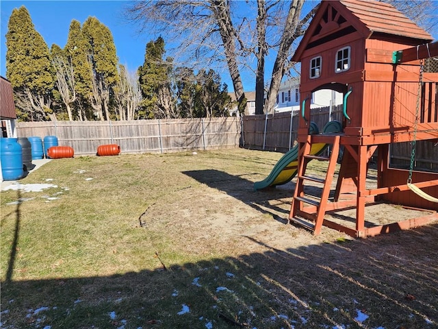 view of jungle gym with a lawn