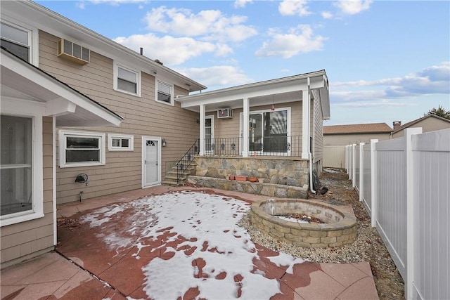 view of patio featuring an outdoor fire pit