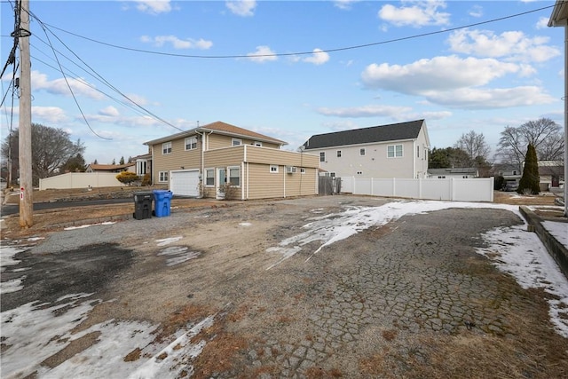 exterior space featuring a garage