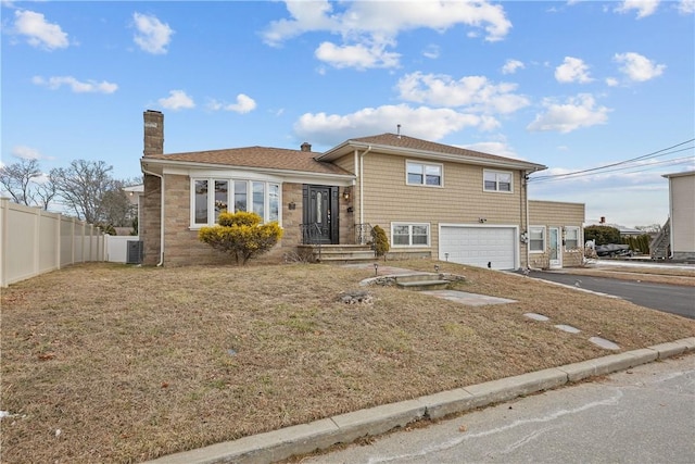 tri-level home with a garage