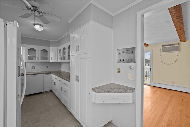 kitchen featuring white cabinetry, white appliances, tasteful backsplash, and crown molding