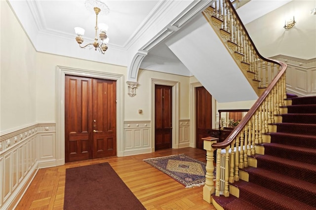 45 Ayrault St Unit 11, Newport, RI 02840 - foyer with an inviting chandelier and ornamental molding