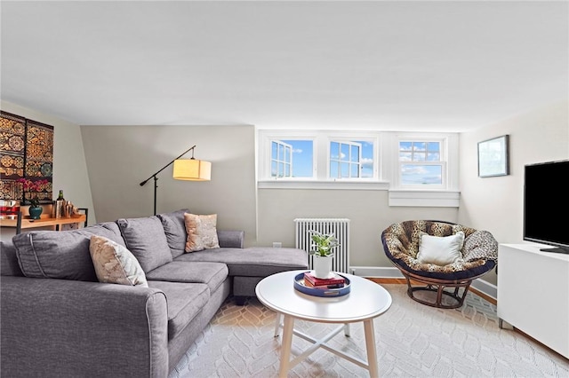45 Ayrault St Unit 11, Newport, RI 02840 - living room featuring radiator heating unit and light hardwood / wood-style floors