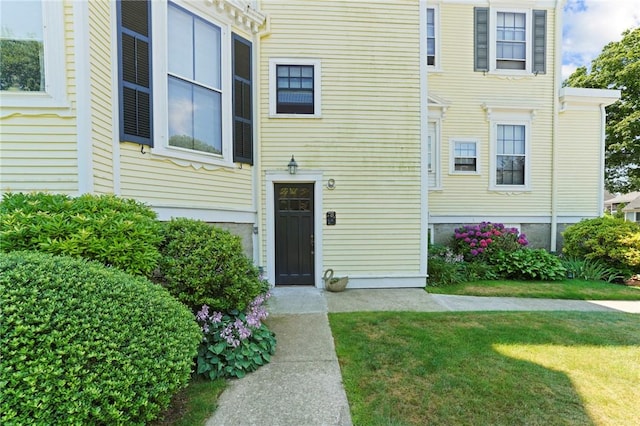 45 Ayrault St Unit 11, Newport, RI 02840 - doorway to property with a lawn