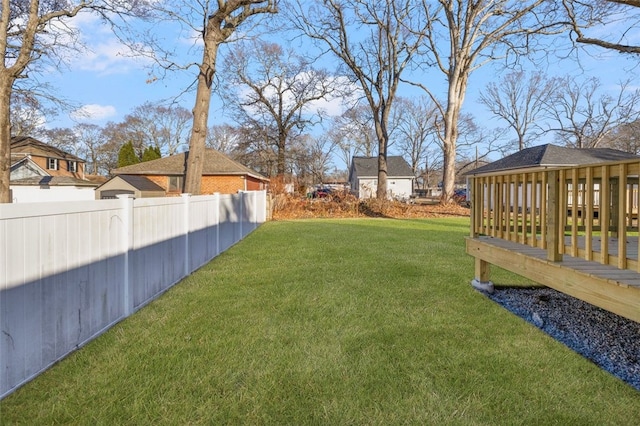 view of yard featuring a deck