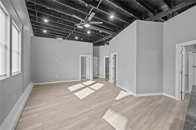 interior space featuring light hardwood / wood-style floors and ceiling fan