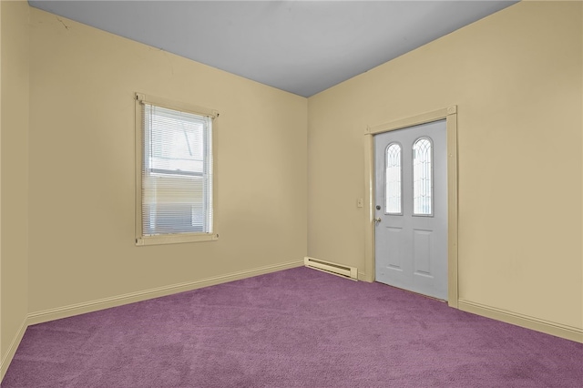 foyer entrance with carpet and baseboard heating