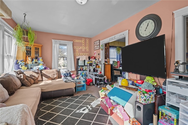 playroom with dark colored carpet