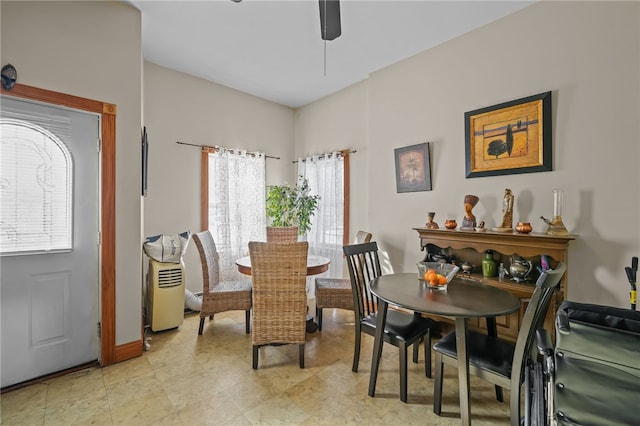 dining space featuring ceiling fan