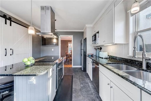 kitchen featuring sink, white cabinetry, hanging light fixtures, stainless steel appliances, and island range hood