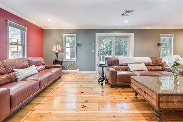 living room with crown molding, light hardwood / wood-style floors, and baseboard heating