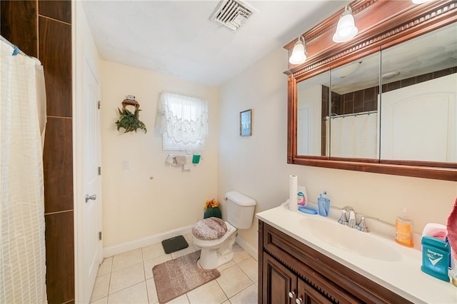 bathroom with tile patterned flooring, vanity, toilet, and a shower with shower curtain