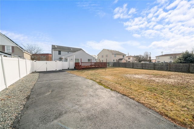 view of yard with a wooden deck