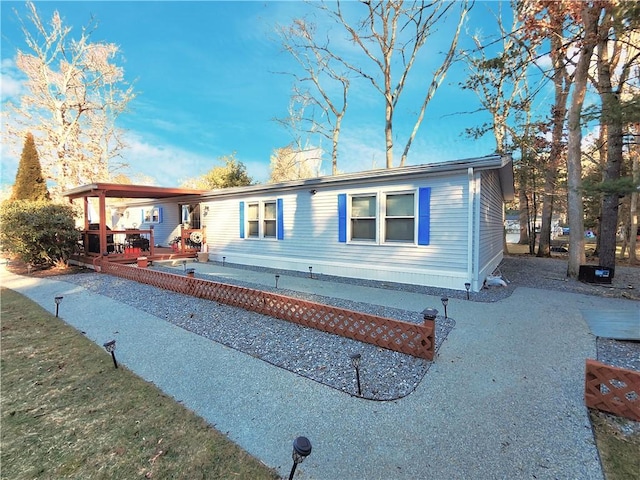 manufactured / mobile home featuring a patio