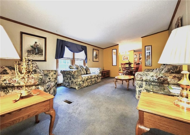 living room with ornamental molding, carpet, and a textured ceiling