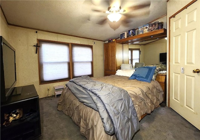 carpeted bedroom featuring crown molding and a textured ceiling