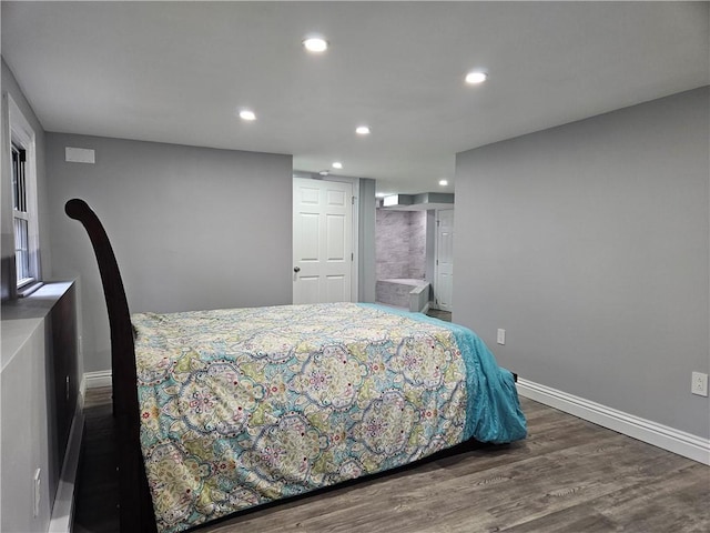 bedroom featuring dark wood-type flooring