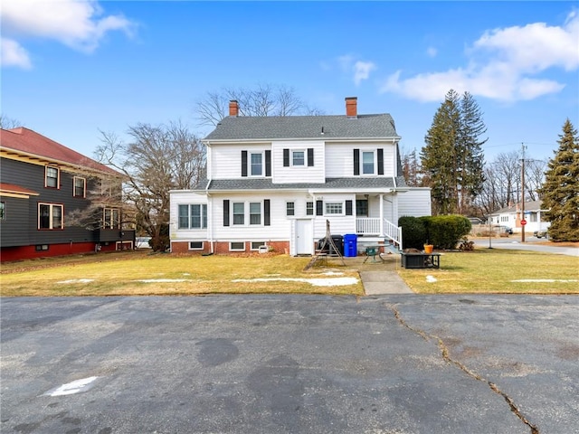 front of property with a front yard