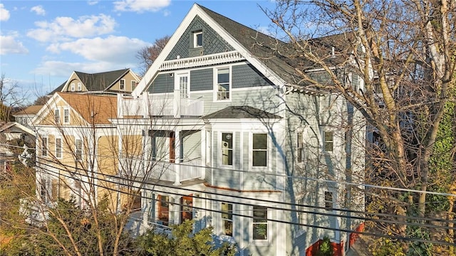 view of front of property with a balcony