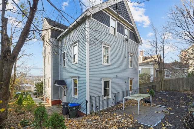 back of house featuring a patio