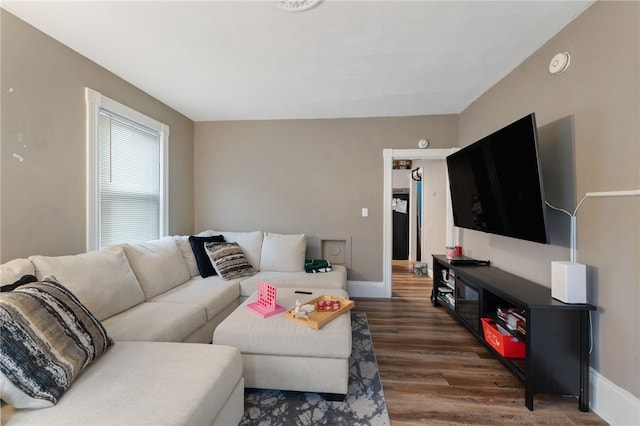 living room with dark wood-type flooring